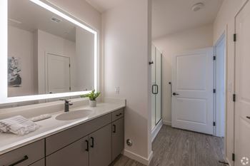 Bathroom with a large mirror